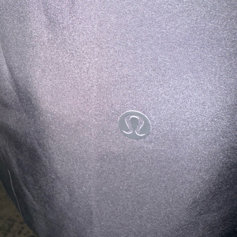 Lululemon size 12 black wind breaker/rain jacket. Perfect condition!